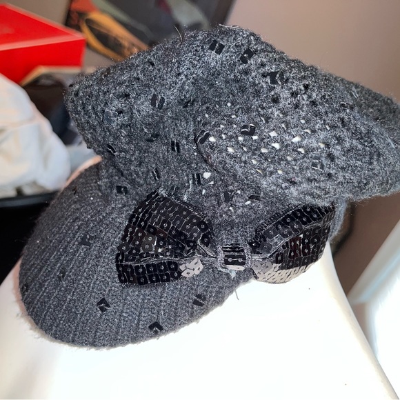 Fabulous black crocheted cap.  Sparkly bow on side. Justice one size fits all. - Picture 2 of 7